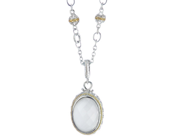 STERLING SILVER OVAL SHAPED DOMED ROCK CRYSTAL PENDANT