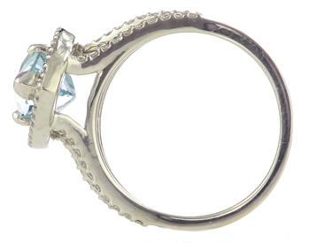14K WHITE GOLD PEAR SHAPED SKY BLUE TOPAZ AND ROUND DIAMOND RING